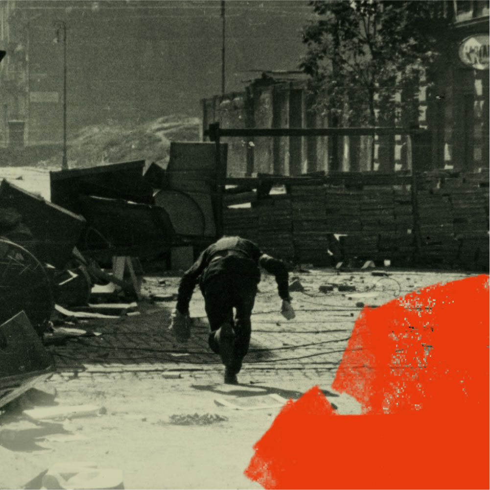 scene of man in bombed city running hunched